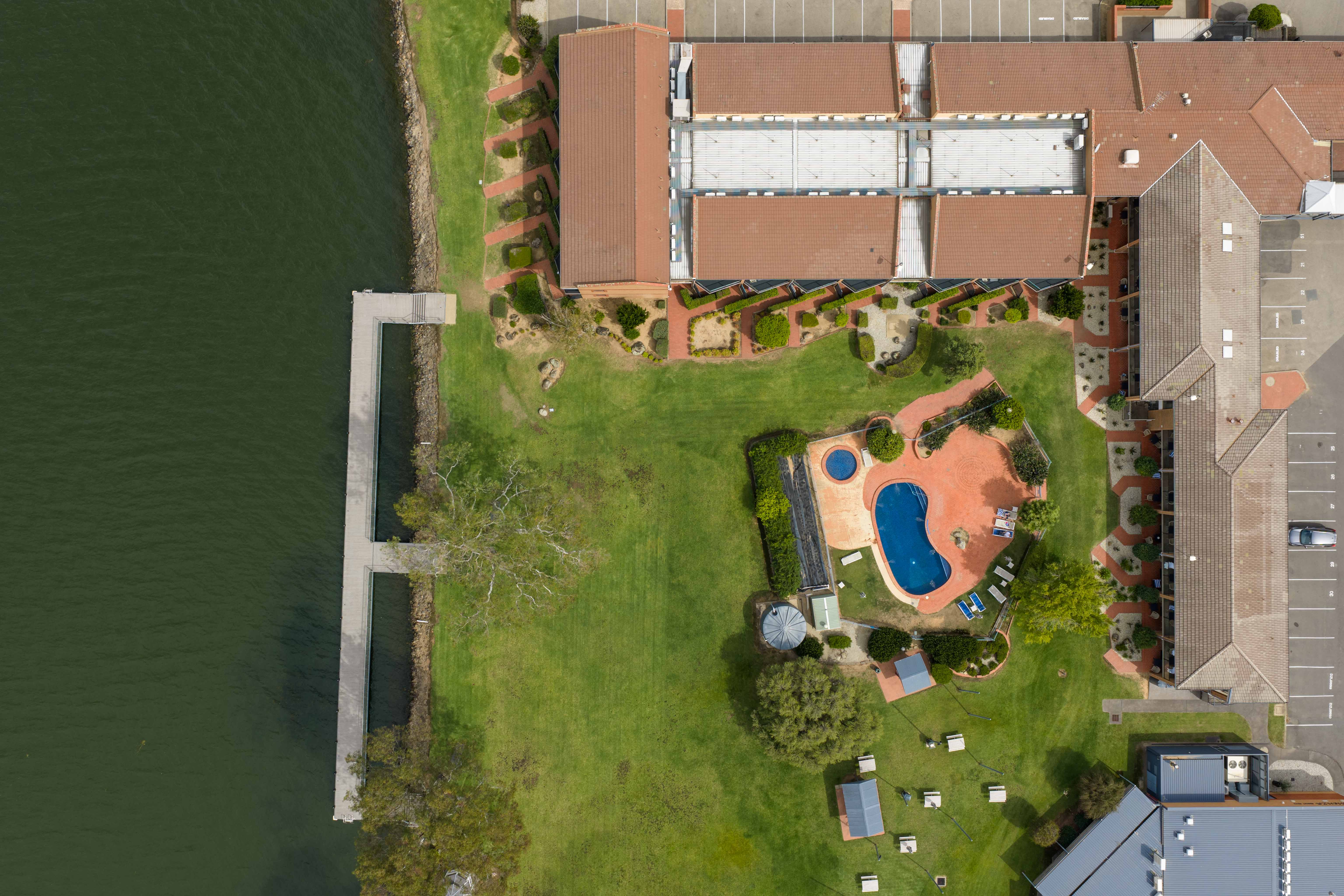 clubmulwala-pool-jetty-topdown-aerial.jpg